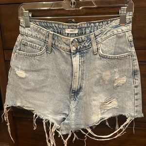 Light Blue distressed cut off High rise denim shorts.